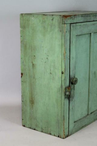 A 19TH C HANGING OR TABLE CUPBOARD IN APPLE GREEN PAINT PANEL DOOR 2