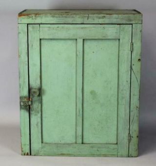 A 19TH C HANGING OR TABLE CUPBOARD IN APPLE GREEN PAINT PANEL DOOR 3