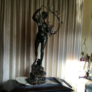 Vintage Spelter sculpture of a standing female figure holding stone flowers 11