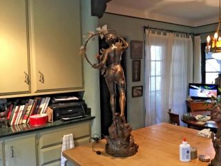 Vintage Spelter sculpture of a standing female figure holding stone flowers 8