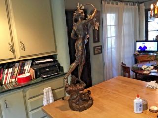 Vintage Spelter sculpture of a standing female figure holding stone flowers 9