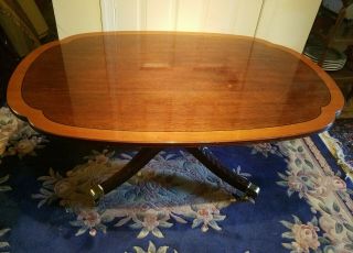 Signed Stickley Cherry Banded Top And Carved Base Coffee table. 3