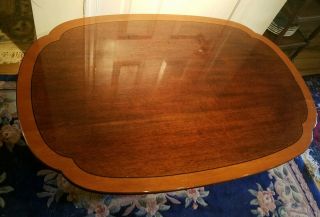 Signed Stickley Cherry Banded Top And Carved Base Coffee table. 6