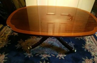 Signed Stickley Cherry Banded Top And Carved Base Coffee table. 7