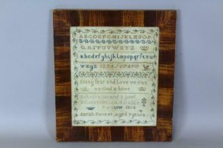 A RARE SIGNED & DATED 1814 NEEDLEWORK SAMPLER 