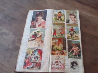 ANTIQUE 1870 ' S LEDGER FILLED W/ 126 VICTORIAN TRADE CARDS AND HANDWRITTEN NAMES 6