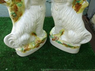 PAIR: 19thC STAFFORDSHIRE SPANIEL DOGS WITH LARGE SPILL VASES c1880 10