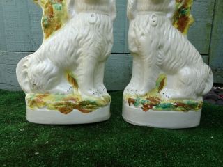 PAIR: 19thC STAFFORDSHIRE SPANIEL DOGS WITH LARGE SPILL VASES c1880 12