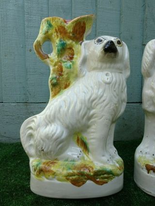 PAIR: 19thC STAFFORDSHIRE SPANIEL DOGS WITH LARGE SPILL VASES c1880 2