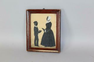 RARE 19TH C CUT AND PAINTED DOUBLE SILHOUETTE OF SCHOOLMARM & BOY WITH BOOKS 2
