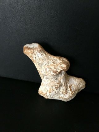 A Small Unusual Palaeolithic Reclining Portable Stone Venus Figurine