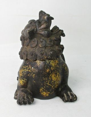 H538: Chinese incense burner of copper of foo dog statue with sign. 5