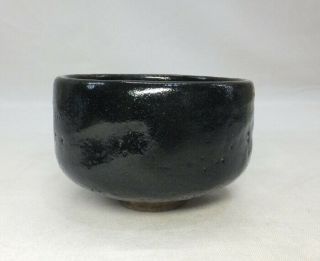 A054: Japanese tea bowl of OLD KURO - RAKU pottery with RAKU ' s sign,  Shifuku 6