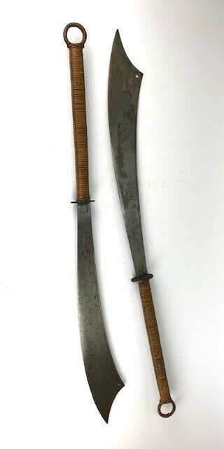 A Fine Antique Vietnamese Rattan Bound Dao Truong Executioner Swords