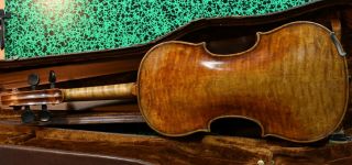 A stunning fine old violin labeled Carlo Bergonzi 1742.  sound. 11