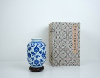 A Small Ming Style Blue And White Vase With Wooden Stand And Box