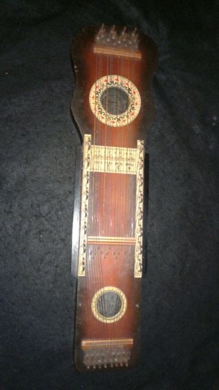 Antique Manufacturers Advertising Ukelin 32 String Wood Instrument W Bow & Music