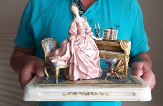 Porcelain figurine a Capodimonte of a female pianist signed A.  Borsato Italy 10
