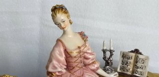 Porcelain figurine a Capodimonte of a female pianist signed A.  Borsato Italy 2