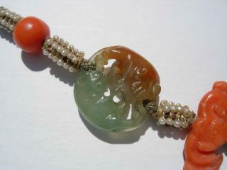 A ANTIQUE CHINESE JADE,  CORAL,  ROCK CRYSTAL & SEED PEARL PENDANTS 3