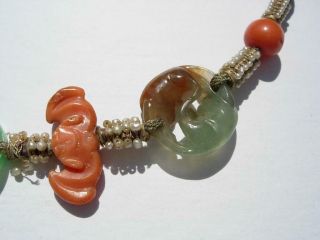 A ANTIQUE CHINESE JADE,  CORAL,  ROCK CRYSTAL & SEED PEARL PENDANTS 9