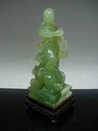 CHINESE GREEN HARDSTONE FIGURE OF A 
