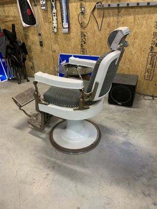 antique Koken barber chair and Koken barber pole 2