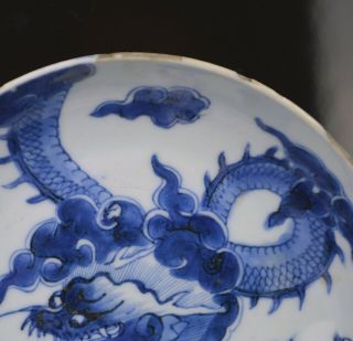 A KANGXI PERIOD CHINESE ' DRAGON OVER THE WALL ' DISH WITH MARK c1700 4