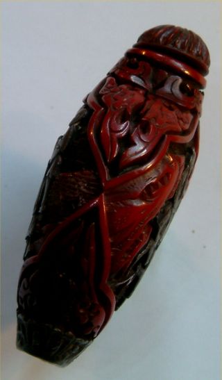 OLD ORIENTAL SNUFF / SCENT BOTTLE CARVED DEEP RED.  PERFECT,  NO CHIPS,  TOP 3