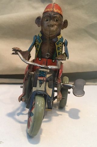 Rare ARNOLD,  US Zone Germany - Wind up Tin Monkey on tricycle 1946 with wind KEY 4