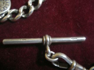 GROUP OF ANTIQUE SOLID SILVER GRADUATED ALBERT CHAINS 200.  5 GRAMS 7