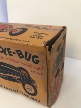 1949 NOSCO Plastic Wind - up Doodle Bug MIdget Racer 9.  25 - inch 12