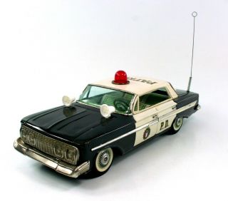 BANDAI (JAPAN) 1961 CHEVY PATROL P.  D.  TIN LITHO FRICTION P.  D.  CAR NR 3