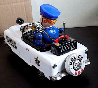 Vintage Tin Battery - Op Mystery Action Police Car,  Nomura Toys (T.  N) Japan.  EXiB 4