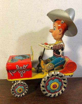 Vintage Unique Art Wind Up Tin Rodeo Joe Crazy Car Jeep