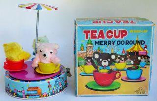 M.  M.  698 Japan Tea Cup Merry Go Round Disney Castle Tin Litho Wind Up Toy W/box