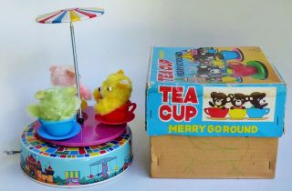 M.  M.  698 JAPAN TEA CUP MERRY GO ROUND DISNEY CASTLE TIN LITHO WIND UP TOY W/BOX 4