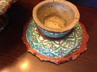 Stack of antique Chinese hand painted multicolored pottery dishes. 4