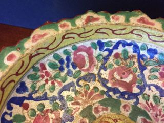 Stack of antique Chinese hand painted multicolored pottery dishes. 6