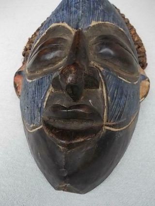 26 / WOODEN HAND CARVED AFRICAN TRIBAL MASK WITH APPLIED PIGMENTS 2