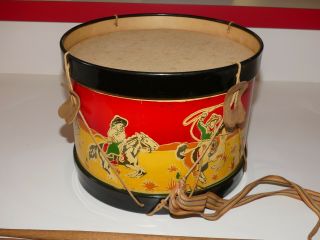 Vintage circa 1930 ' s tin toy drum with cowboys and indians on horseback 3