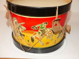 Vintage circa 1930 ' s tin toy drum with cowboys and indians on horseback 6