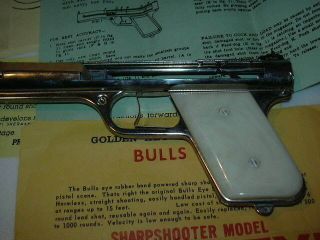 Bulls - Eye Sharpshooter Vintage Rubber Powered Pistol Nickle & Paper work, 4