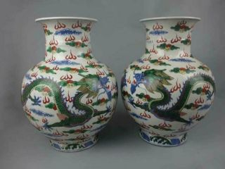 A pair Chinese antique porcelain wucai Dragon - phoenix pattern vase 3