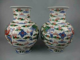 A pair Chinese antique porcelain wucai Dragon - phoenix pattern vase 4