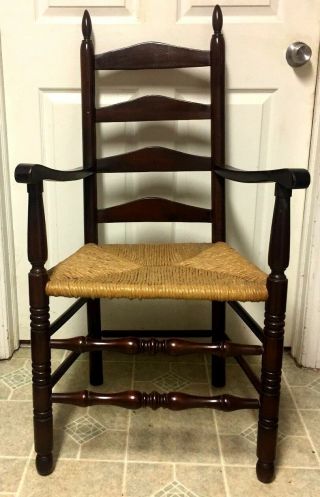 Antique Dark Wood Tone Ladder Back Arm Chair Rush Seat Captain Chair -