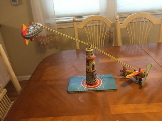 Unique Art Sky Ranger Tin Litho Wind Up Toy Circa Tin Litho Wind Up Toy