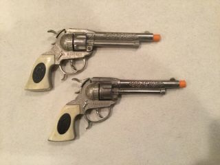Matched pair Leslie Henry Maverick cap guns 2