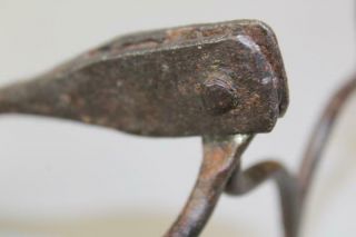 A VERY RARE 18TH C HEART DECORATED WROUGHT IRON FISH ROASTER WITH A LONG HANDLE 10