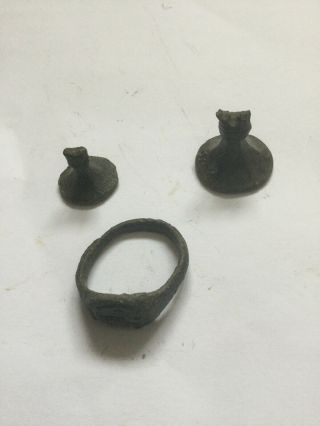 Two Medieval Bronze Seal Matrices And A Merchant’s Seal Ring.